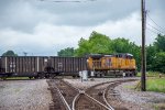 The rear DPU of a southbound coal train clatters across the diamond 